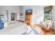 Cozy bedroom with natural light, wooden accents, and calming decor at 2373 S Joyce St, Denver, CO 80228