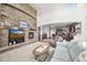 Close up of the fireplace in the living room with built-in shelving at 2373 S Joyce St, Denver, CO 80228