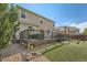 An outdoor deck and artificial grass in the backyard of the home at 16685 Trail Sky Cir, Parker, CO 80134