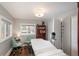 Bright bedroom featuring a medical bed, chairs, and a bookshelf at 5382 S Pine Rd, Evergreen, CO 80439