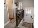 Inviting entryway with a tiled floor, coat rack, and shoe storage at 5382 S Pine Rd, Evergreen, CO 80439