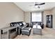 Cozy living room with comfortable seating, sleek modern furniture, and bright natural light at 471 N Jackson Gap Way, Aurora, CO 80018