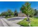 Inviting street view of a well-manicured lawn and a charming home with mature trees at 598 Crossing Cir, Castle Pines, CO 80108