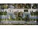 Aerial view of a charming complex with allocated parking and well-maintained green spaces, offering a community feel at 2872 Jasmine St, Denver, CO 80207