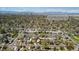 Stunning aerial view of the neighborhood with city skyline and mountains in the distance at 2872 Jasmine St, Denver, CO 80207