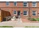 View of a cozy patio with a fire pit and comfortable outdoor seating, perfect for relaxing or entertaining guests at 2872 Jasmine St, Denver, CO 80207