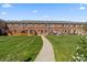 Backyard has a well-maintained lawn providing ample space for outdoor activities at 2872 Jasmine St, Denver, CO 80207