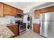 The kitchen offers stainless steel appliances and efficient stacked washer and dryer at 2872 Jasmine St, Denver, CO 80207