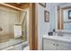 Bathroom features a white sink and a shower over a bathtub with glass doors at 1080 Ski Hill Rd # 9, Breckenridge, CO 80424