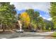 Charming exterior view of a condo in a wooded area with mountain views at 1080 Ski Hill Rd # 9, Breckenridge, CO 80424