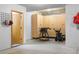 Unfinished basement area featuring cabinets, storage and ample space for hobbies or projects at 30455 Telluride Ln, Evergreen, CO 80439