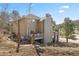 Charming home with a spacious deck, perfect for enjoying the serene surroundings and outdoor living at 30455 Telluride Ln, Evergreen, CO 80439