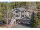 Beautiful two-story home with a well-maintained yard, offering a welcoming curb appeal at 30455 Telluride Ln, Evergreen, CO 80439