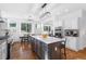 Spacious kitchen with a large island, stainless steel appliances, and breakfast nook at 30455 Telluride Ln, Evergreen, CO 80439