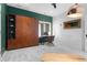 Functional office space featuring a murphy bed, desk, and ample natural light at 30455 Telluride Ln, Evergreen, CO 80439