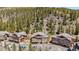Scenic aerial view of well-maintained townhomes set against a backdrop of majestic mountain at 283 Pelican Cir # 1703, Breckenridge, CO 80424