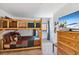 A bedroom featuring wooden bunk beds, a window, and a TV screen on the wall at 283 Pelican Cir # 1703, Breckenridge, CO 80424