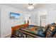 Comfortable bedroom with wood accents, and an ensuite bathroom, providing a tranquil retreat at 283 Pelican Cir # 1703, Breckenridge, CO 80424