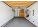 Clean and organized garage with storage space, hooks, and ample lighting at 283 Pelican Cir # 1703, Breckenridge, CO 80424