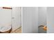 Hallway nook featuring tile flooring, white walls, a door and a coat rack with coat hooks at 283 Pelican Cir # 1703, Breckenridge, CO 80424