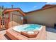 Community hot tub with wooden deck surround, a perfect spot for relaxation at 283 Pelican Cir # 1703, Breckenridge, CO 80424