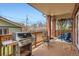 Back deck is covered and has a grill and seating for entertaining at 821 S High St, Denver, CO 80209