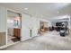 Finished basement area with a laundry room, rec space, and exercise equipment at 821 S High St, Denver, CO 80209