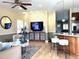 Cozy living room with hardwood floors, neutral walls, and adjacent to kitchen at 821 S High St, Denver, CO 80209