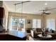 Inviting living room featuring hardwood floors, a cozy sofa, and access to an outdoor patio at 821 S High St, Denver, CO 80209