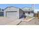 Charming home featuring a two-car garage and inviting entryway, perfect for a cozy Gathering living at 1923 Ensenada Ct, Aurora, CO 80011