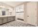 Elegant bathroom with a walk-in shower and double vanity at 2905 Morningbird Ln, Castle Rock, CO 80109