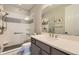 Modern bathroom with a walk-in shower and double vanity at 2905 Morningbird Ln, Castle Rock, CO 80109