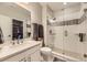 Basement bathroom with a walk-in shower and modern vanity at 2905 Morningbird Ln, Castle Rock, CO 80109