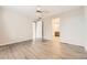 Bedroom with wood-look floors and ensuite bathroom access at 2905 Morningbird Ln, Castle Rock, CO 80109