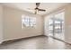 Bright bedroom with sliding door access to a patio at 2905 Morningbird Ln, Castle Rock, CO 80109