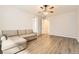 Bedroom with L-shaped sofa and ceiling fan at 2905 Morningbird Ln, Castle Rock, CO 80109