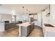 Modern kitchen with stainless steel appliances and an island at 2905 Morningbird Ln, Castle Rock, CO 80109