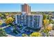 Multi-story apartment building with ample parking and landscaping at 4800 E Hale Pkwy # 709N, Denver, CO 80220