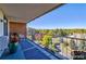 Private balcony with treetop and city views at 4800 E Hale Pkwy # 709N, Denver, CO 80220