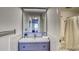 Bright bathroom with vanity, toilet and shower at 4800 E Hale Pkwy # 709N, Denver, CO 80220