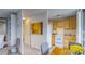 Efficient kitchen with light wood cabinets at 4800 E Hale Pkwy # 709N, Denver, CO 80220