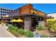 Postino restaurant exterior with patio seating at 4800 E Hale Pkwy # 709N, Denver, CO 80220