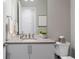 Modern powder room with single vanity and toilet at 1196 Lost Elk Loop, Castle Rock, CO 80108