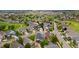 Neighborhood with neatly arranged homes featuring well-maintained lawns and mature trees at 22166 E Chestnut Pl, Aurora, CO 80016