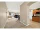 Open-concept view into a large living room, featuring stairs to a basement, and an entry into the kitchen at 22166 E Chestnut Pl, Aurora, CO 80016