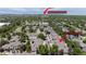 Aerial view of homes and community near 584 Ridge View Dr. and the Louisville Rec Center with mature trees at 584 Ridgeview Dr, Louisville, CO 80027