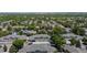 Expansive aerial shot showcasing a neighborhood filled with mature trees, charming homes, and well-kept landscaping at 584 Ridgeview Dr, Louisville, CO 80027