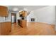 Bright kitchen with stainless steel appliances and hardwood floors at 584 Ridgeview Dr, Louisville, CO 80027
