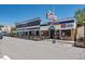 Street view of a commercial area with restaurants and a brewery, showcasing outdoor seating and architectural details at 584 Ridgeview Dr, Louisville, CO 80027