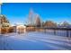 Spacious back deck covered in snow, perfect for relaxing in the sun or entertaining guests at 2786 E 118Th Cir, Thornton, CO 80233